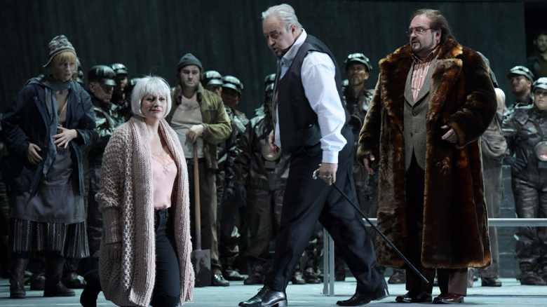 Julia Dawson (Axinya), Anja Kampe (Katerina Izmailova; kneeling), Theo Lebow (1st Foreman; behind her), Dmitry Belosselskiy (Boris Iszmailov; with stick) & Evgeny Akimov (Zinovi Izmailov)